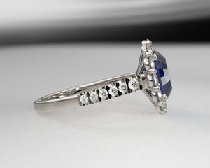 Ladies platinum and diamond sapphire ring