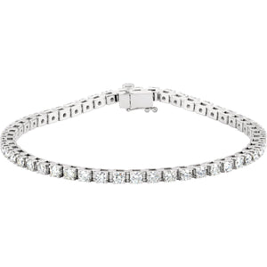 Ladies 18kt white gold tennis bracelet mounting to house 34 x 5mm round brilliant cuts