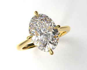 Madeline's 4 prong Signature Solitaire